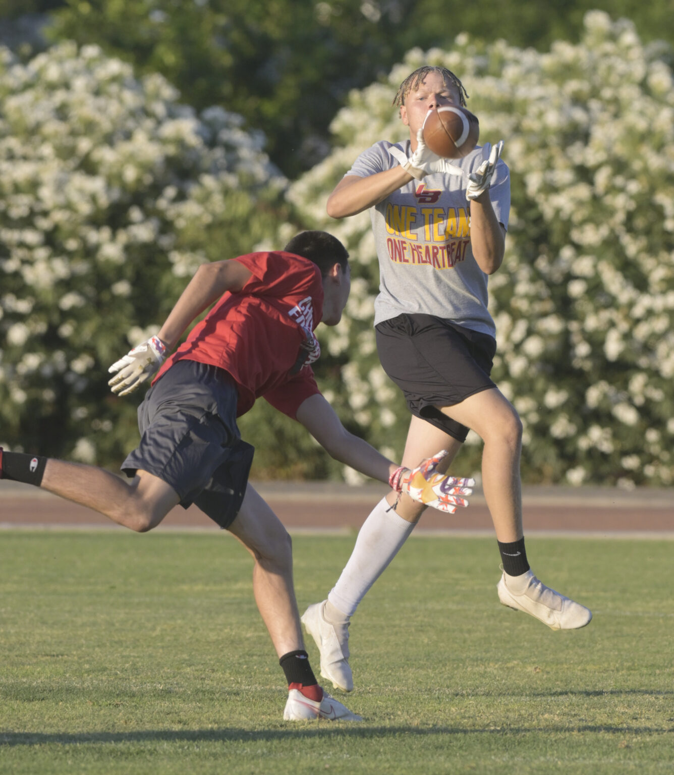 Los Banos Tiger football conducts 7 on 7 passing league scrimmage The