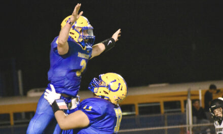 Dos Palos prevails in TD shootout