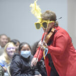 VIOLINIST PERFORMS FOR 4TH GRADERS