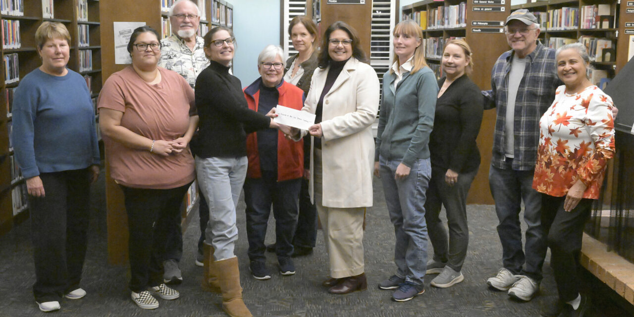 Los Banos Library Friends, PAL, firefighters receive Anderson Homes donations