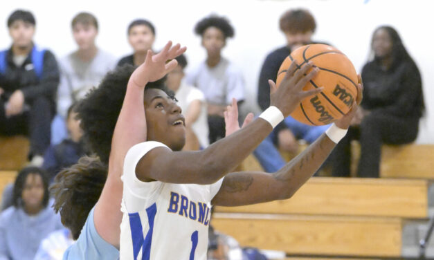 Broncos open hoop season with win over Yosemite