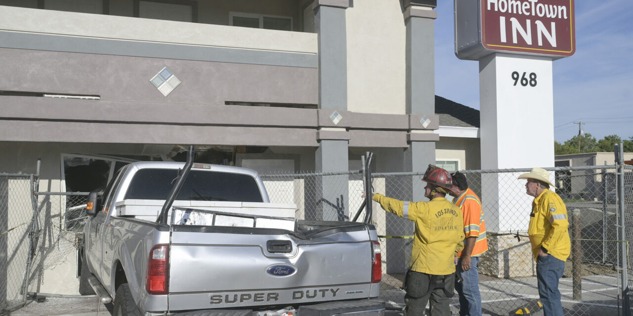 Stolen truck crashes into motel