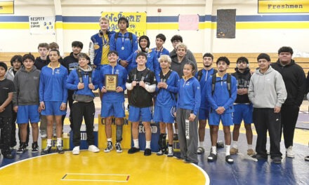 High school wrestlers dive into tournament action