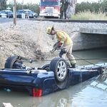Three dead following overturned SUV in canal